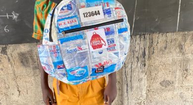 A Ghanian boy with his Trashy Bag SchoolBag