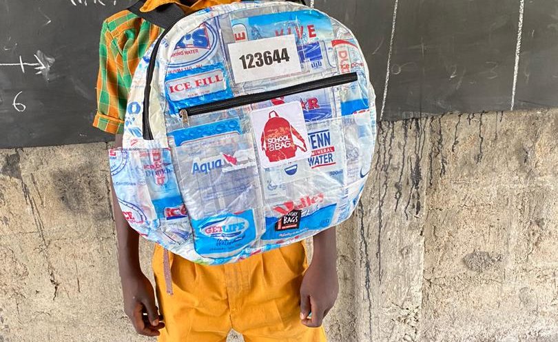 A Ghanian boy with his Trashy Bag SchoolBag